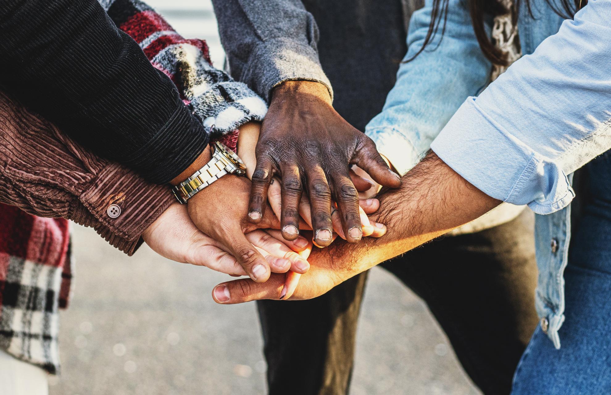 Diverse Hands Coming together